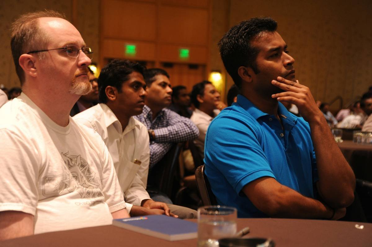 Developers, database administrators, technologists, many in the US on H1-B Visas to work, mostly men, some US citizens, some Canadians, during a Town Hall company meeting, "Design Thinking: because it betters us in our disciplines", Bellevue, Washington, USA drop a penny if you wish https://paypal.me/1drlane wonderlane@gmail.com